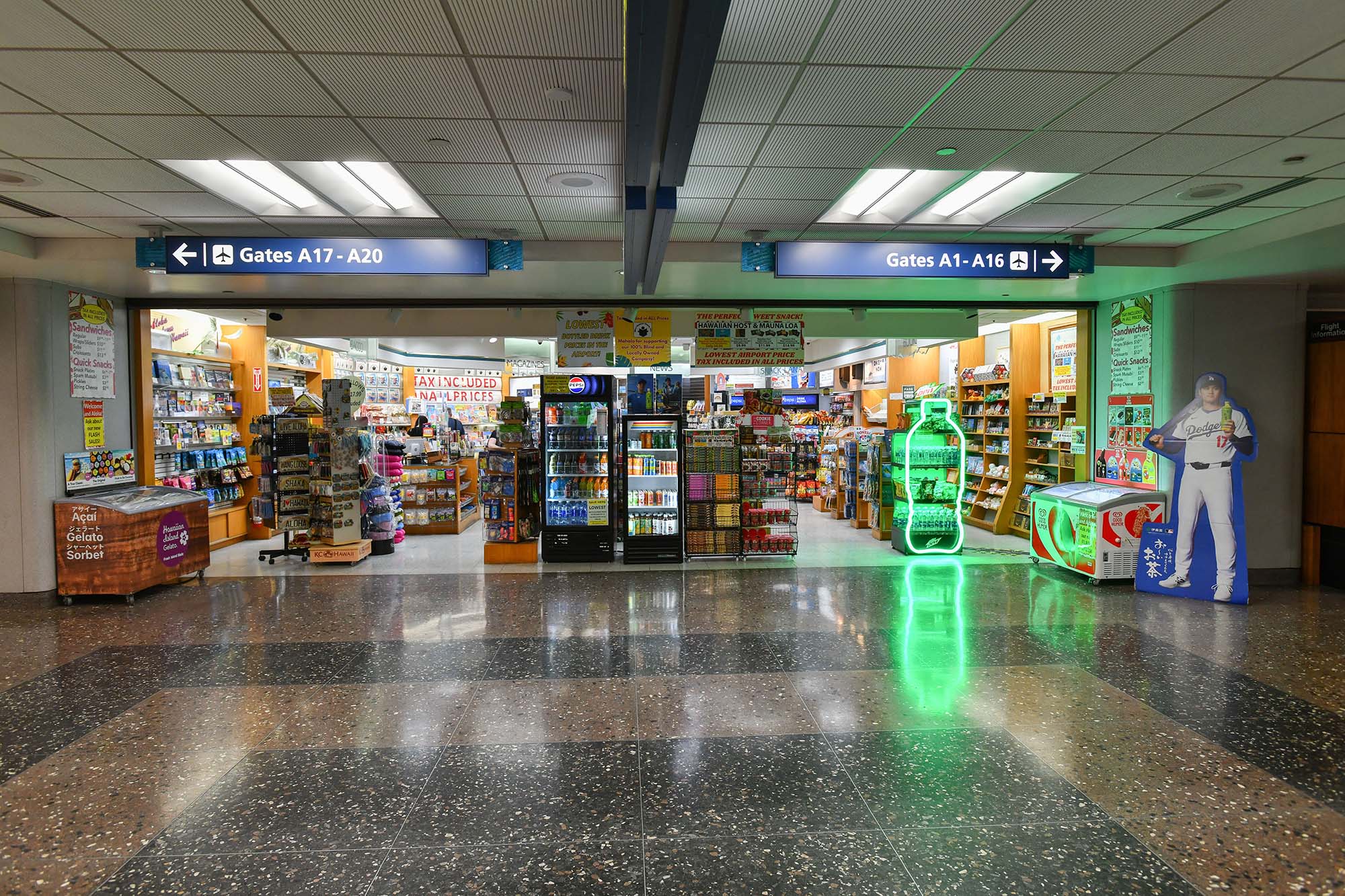 Travelers passing through Daniel K. Inouye International Airport in Honolulu.